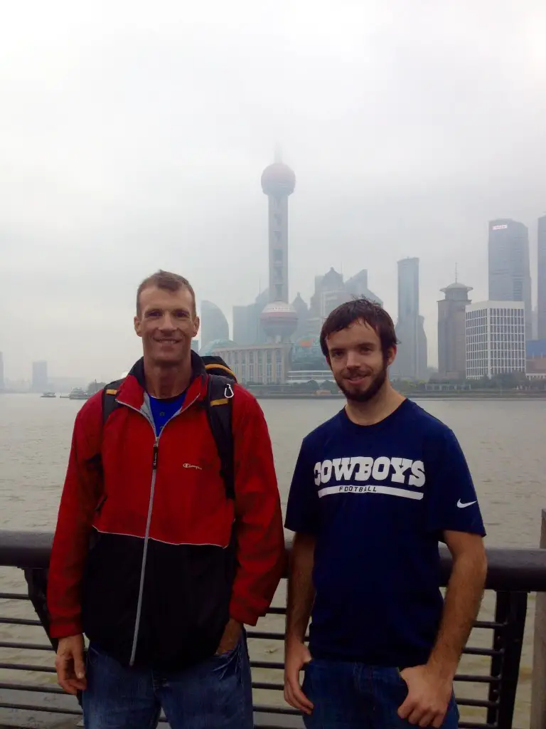 Chilling out on the Bund. Such a baby with no beard!!