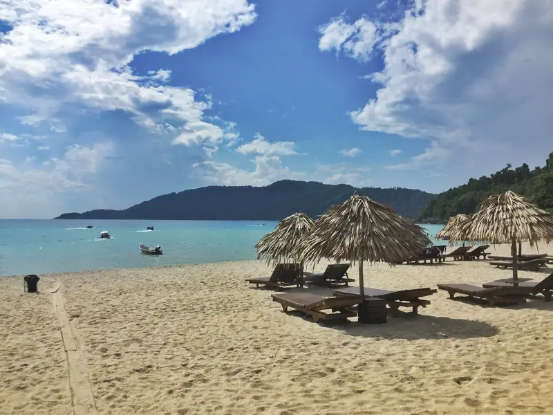 beach with umbrella and water view